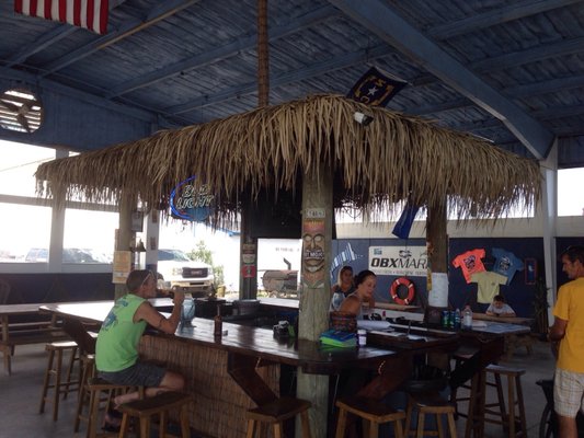 Beer & wine now being served under the Tiki Hunt at the OBX Marina.