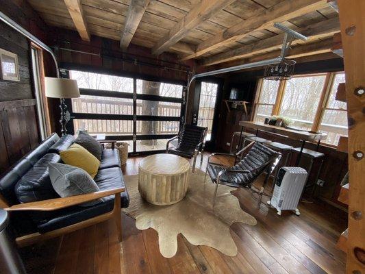 Living room with beautiful view off the deck