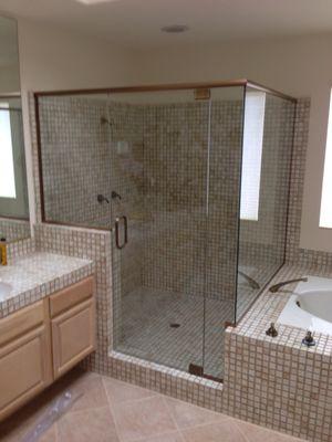 90 deg shower enclosure with two inline panels and one return panel with header