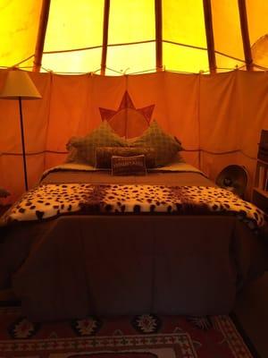 Comfy futon bed inside tipi