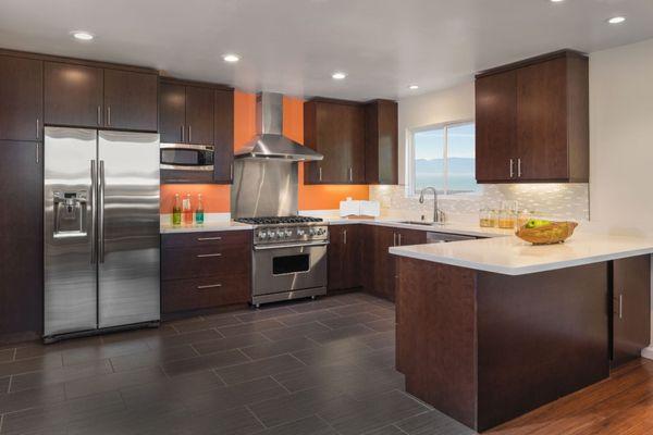 Modern and open kitchen remodel, beautiful stainless steel appliances and gas range stove