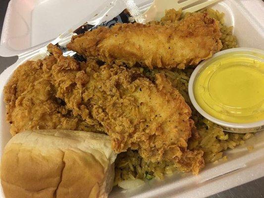 Chicken tenders, fried rice, dinner roll, and homemade honey mustard sauce