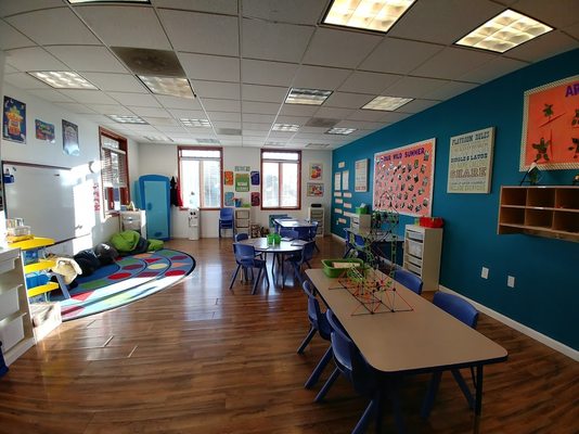 Our After School room serves ages 5 (Kindergarten) to 12 with areas for self-led exploration of science, art, math,and writing activities.