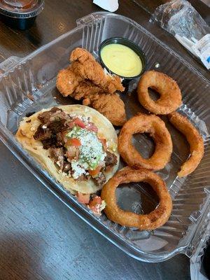 Street tacos and Chicken tenders with onion rings