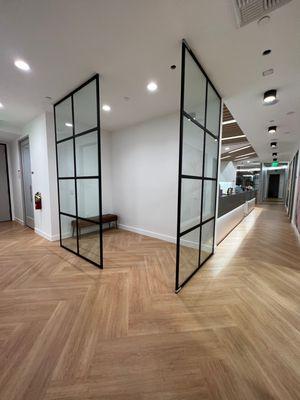 Grid pattern on this glass wall! Matte black is a popular finish and makes white rooms stand out more.