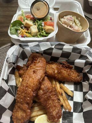 Fish & Chips with side salad, fries, & cole slaw.