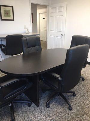 6' Espresso Conference Table with High Back Conference Room Chairs.    Adjustable Height Worksurface in the background.