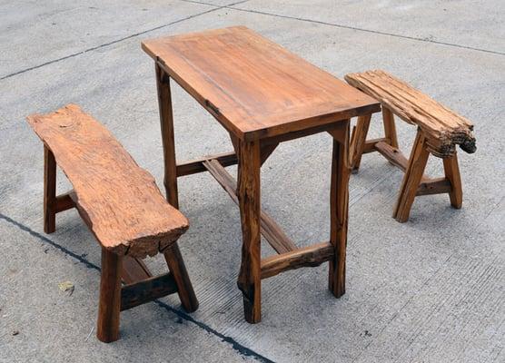 More recent arrivals from Thailand! This reclaimed teak wood table and bench set will look great in your dining room.