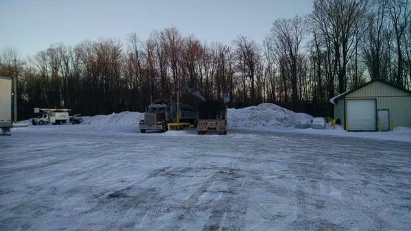 Large snowbanks help break the blustery winter winds a little.