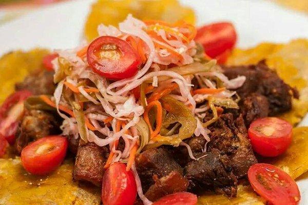 Fritay Platter.  Griot (Fried Pork) served with Plantains and Pikliz.