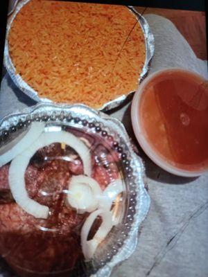 Fried Pork Chops beans with yellow rice . Love this place food is always good .