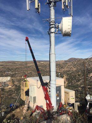 Mountain top install with a spyder crane.