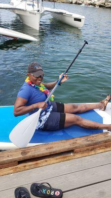 Amazon Beard paddeling out at Pride Paddleout held by Olympus Standup Paddleboards...