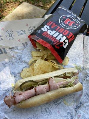 $6.36: 6” ham, provolone, mayo, pickles, onion, peppers, Dijon, lettuce, and tomato with a bag of chips - fully customizable.