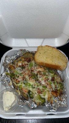 Loaded Mesquite Potato w/ garlic toast