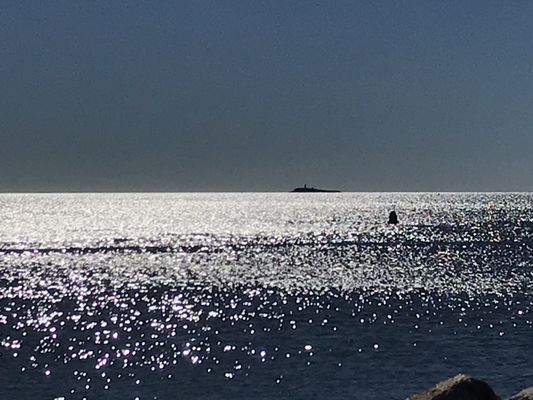 1/27/22 Faulkner's Island seen in the sun reflected shimmering water of Long Island Sound,l.