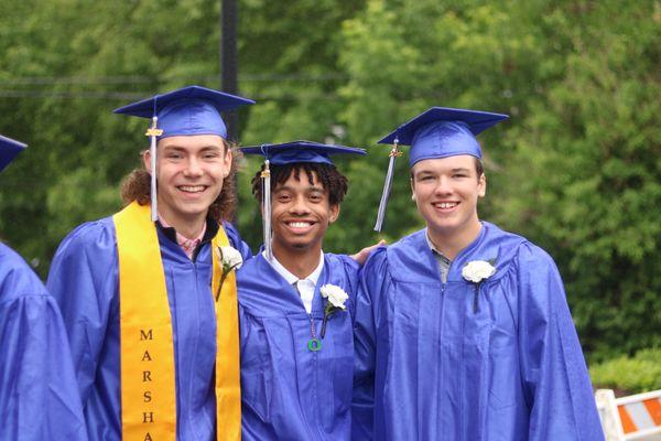 Landmark graduates walking to commencement