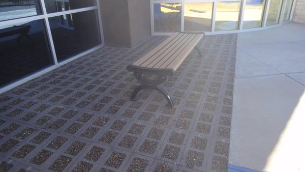 Permeable(aka pervious or porous) patio.  This is a great idea in El Paso!  Allows for a recharge of the groundwater.