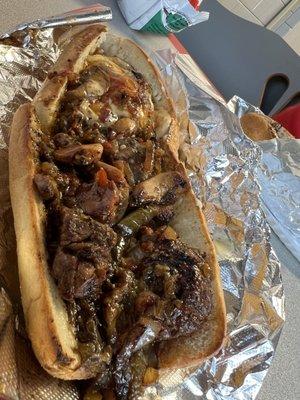 Steak tip bomb with hots. Toasted. Oozing with cheese, look in the back! so damn good. No gristle.  $14.99