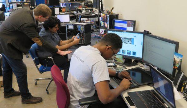 Public school students learn computer tech from donated computers.