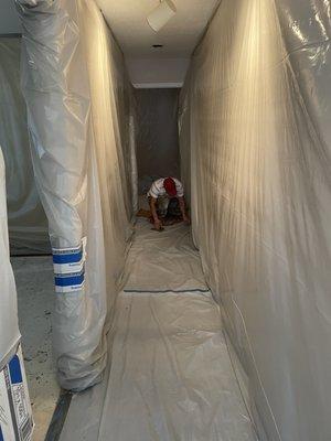 Interior protection before installing pilings inside the home.