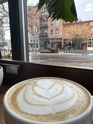 Enjoying an amazing cup of awesome on a rain morning. The cranberry orange scone didn't make the picture.