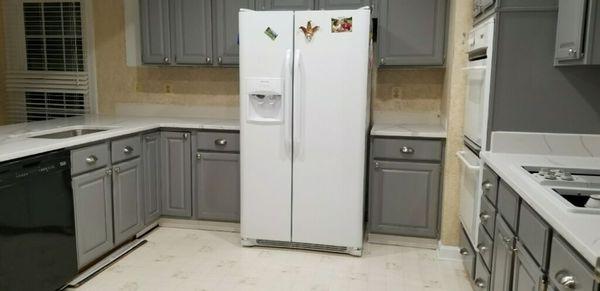 White Quartz Countertop with gray cabinet. Modern Kitchen design. Stunning.