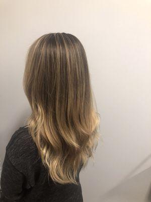 This client had ombré 6+ months ago and decided to bring the blonde up to the root with a partial foil to blend and brighten her base.