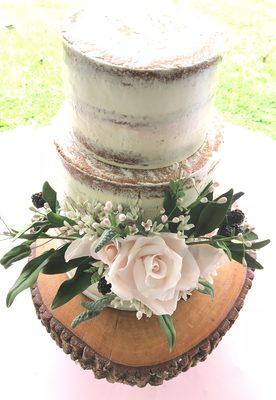 Necked cake with sugar flowers