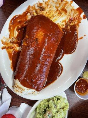 This was a monster of a burrito. Chorizo, eggs, potatoes, and more. Smothered in enchilada sauce (wife doesn't do spicy).