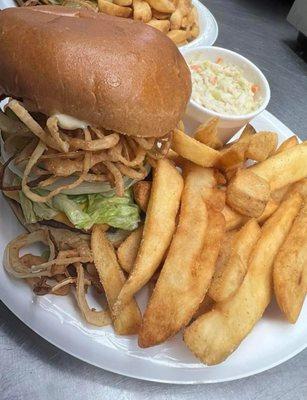 A big big delta burger with a side of fries and our homemade coleslaw