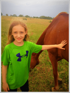 Young rider enjoying her horse