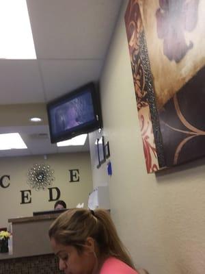 Nice clean waiting room. Television for you to enjoy while you wait