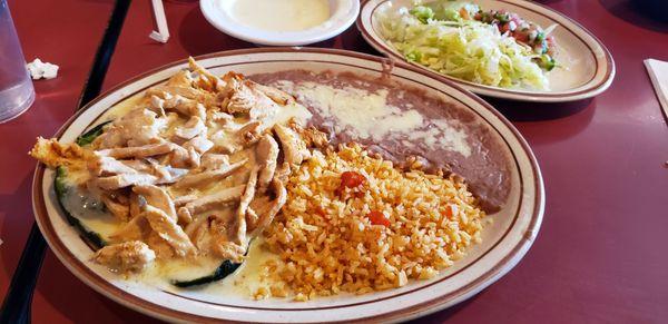 Chicken Poblano with rice and beans Cheese dip