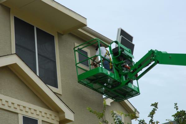 Solar screens create a uniform and pleasing look as well as blocking the sun's heat from entering the window.