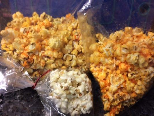 Left: cheddar/caramel Right: jalapeño cheddar Front: marshmallow popcorn ball