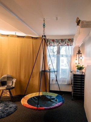 Multiple swing options to facilitate sensory integration and speech. Photo credit: Milly Lee