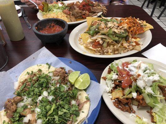 Pastor tacos, carnitas sopes, enchiladas rancheras, and pollo nachos