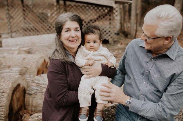 Senior Pastor Mitchell Bias, wife and Associate Pastor Regina Bias, and grandson