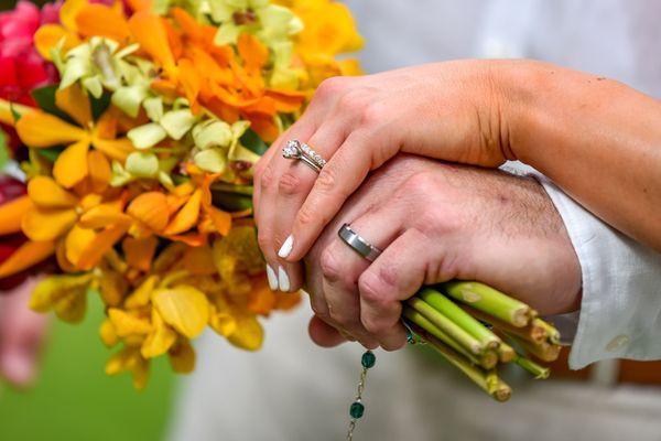 Our bands on wedding day.  My husband also got his tungsten ring from KG