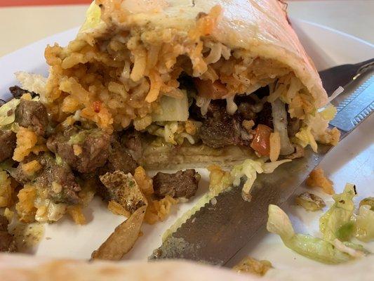 This was so delicious . Carne Asada, lettuce , Tomato , Rice  and French Fries .