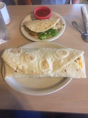 A size comparison of the large and small burrito! Bring your appetite if you go for the large!