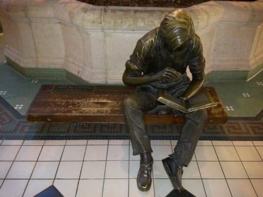 J. Seward Johnson sculpture, "Out to Lunch", on lower level of Georgetown Park mall, January 2012.