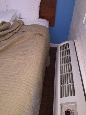 AC right next to the bed