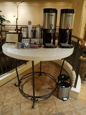 This beverage setup is set up right by the entrance of the restaurant, and it's complimentary!