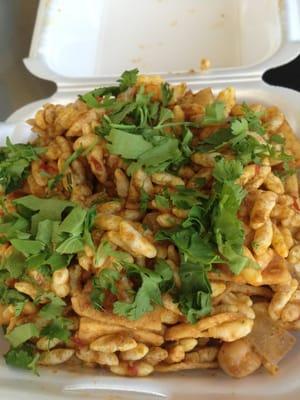 Bhel puri topped with cilantro, the way it's supposed to be.