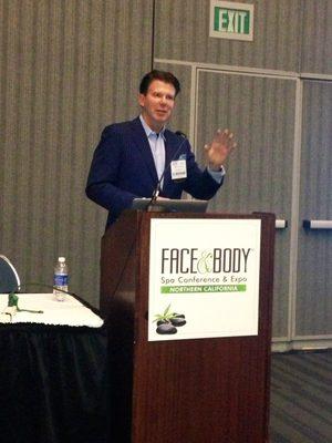 Dr. Corey Maas teaching at the Face and Body conference.