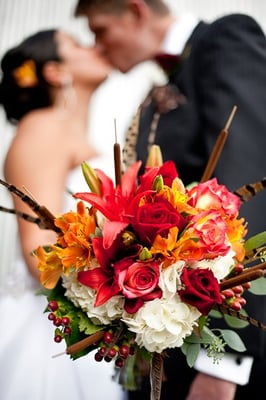 Look at the beautiful wedding flowers! Minneapolis Wedding Photographer photographs a couple during their first look! www.michel