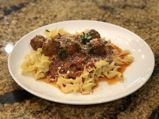 Organic Meatballs with pasta and meat sauce by Nur Deen, proprietor of Chameleon Catering LLC.