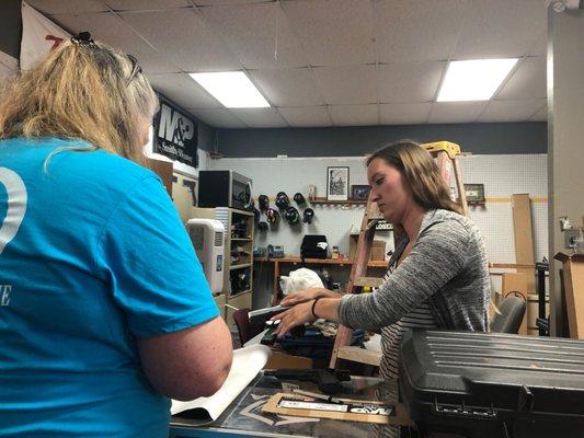 Wife receiving instruction from Lauren at American Armory on a Ruger SR22.